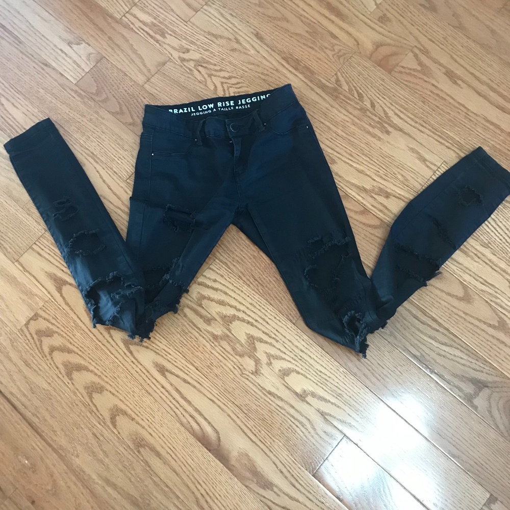 Black low rise ripped skinny jeans